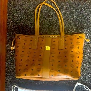 Authentic MCM medium size bag with duster.